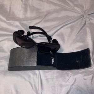 Prada scroll sunglasses with case.  No scratches case gently worn.